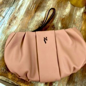 Nude or camel color hand bag - clutch with strap